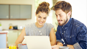 Getting started What sets us apart - Couple with laptop